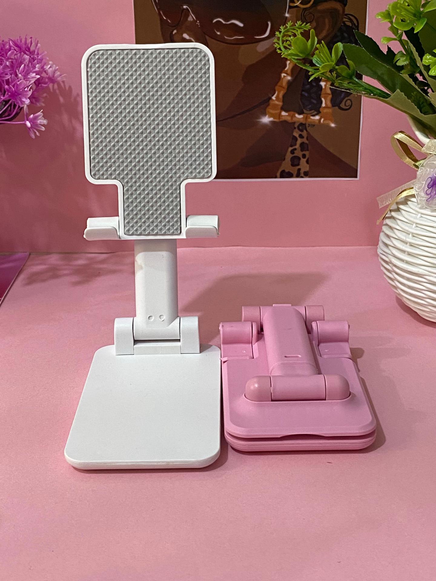 Adjustable phone holder/stand